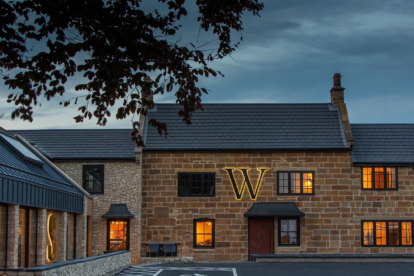 Wainstones Hotel exterior at dusk